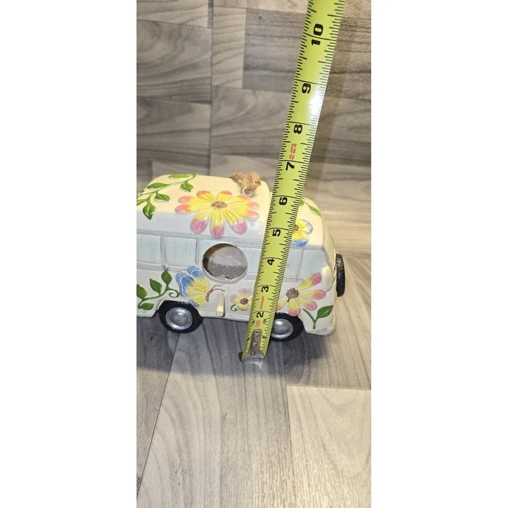 decorative birdhouse styled like a vintage camper van
